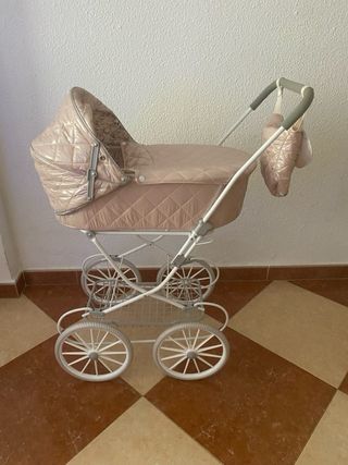 Carrito de bebé rosa