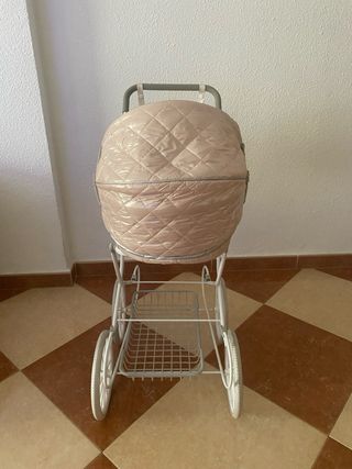 Carrito de bebé rosa