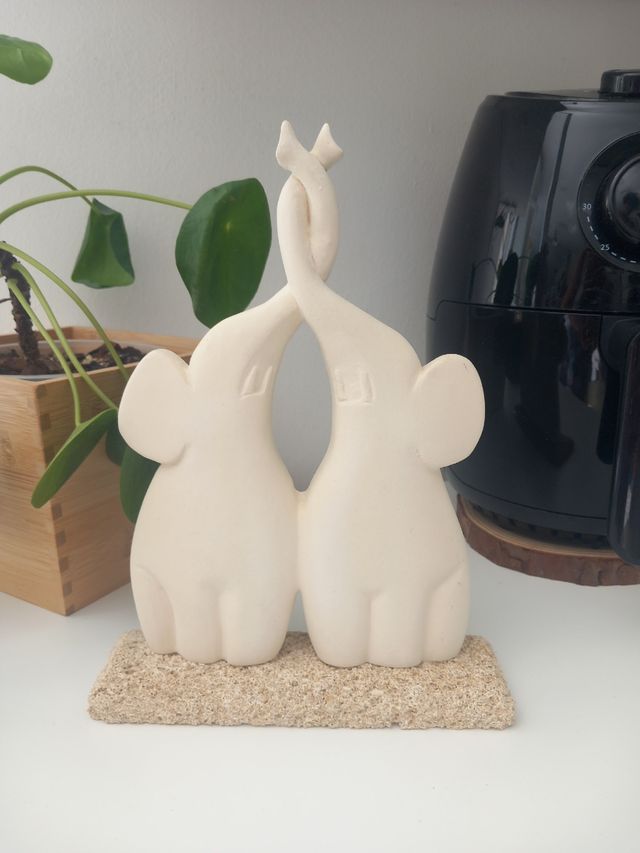 Scultura coppia elefanti intrecciati