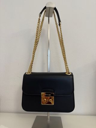 Borsa Michael Kors nera con tracolla a catena