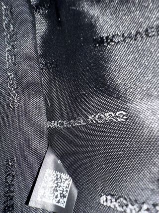 Borsa Michael Kors nera con tracolla a catena