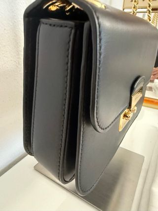 Borsa Michael Kors nera con tracolla a catena