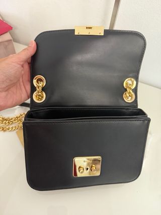 Borsa Michael Kors nera con tracolla a catena