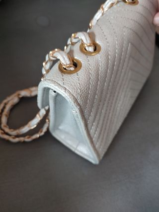 Borsetta argento con catena dorata