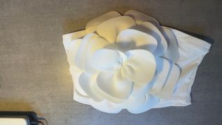 Top blanco con flor XL pero como M