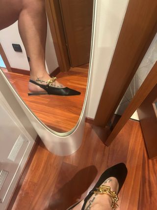 Ballerine nere con fibbia dorata