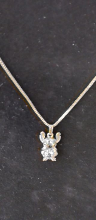 Cadena con dije de Stitch oro laminado 14k 