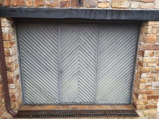 Puerta de garaje metálica gris 97 de anchea y 2.10