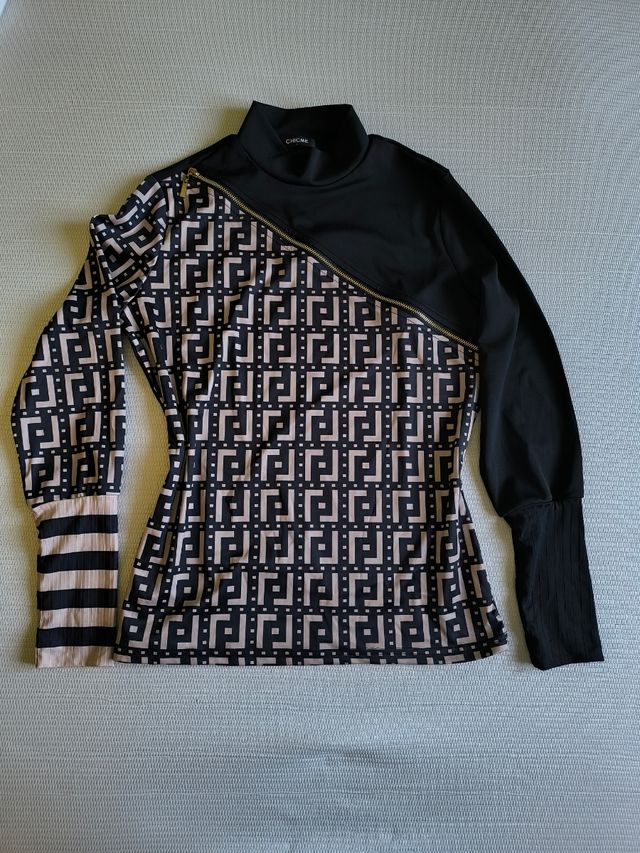 Jersey cuello alto estampado