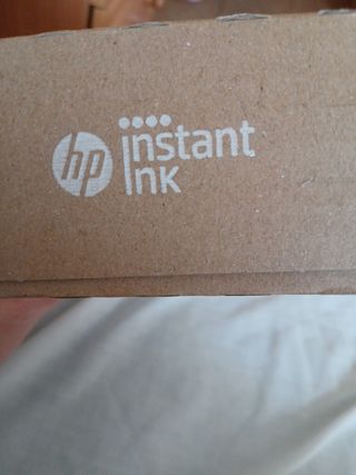 Caja precintada con dos tinta de impresora