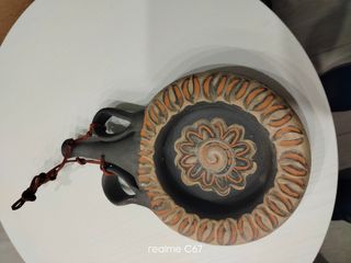 Cerámica artesanal asturiana negra y naranja