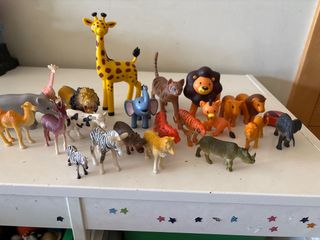 Bambole animali in plastica