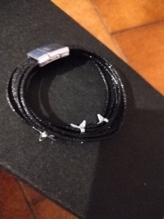 Braccialetto nero con stelle argento