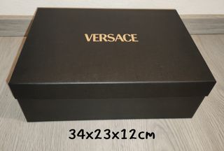 Versace. Scatola Nera. uomo