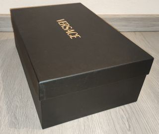 Versace. Scatola Nera. uomo