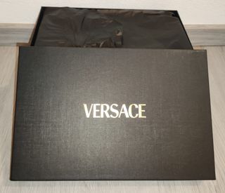 Versace. Scatola Nera. uomo