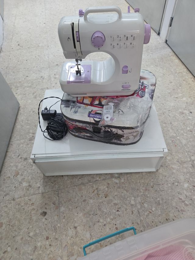 Máquina de Costura Portátil