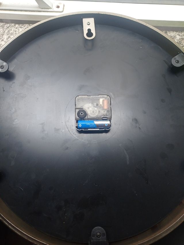 Reloj Heineken verde círculo metal. Funciona.