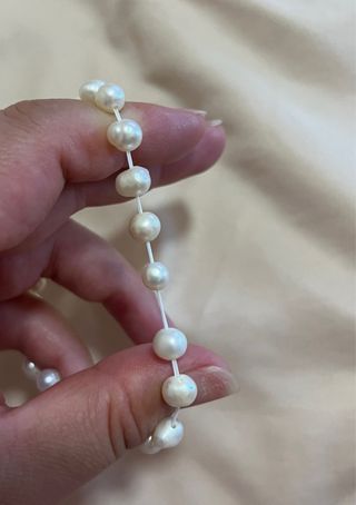 Pulsera de perlas con colgante