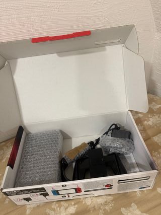 Nintendo Switch + SD + Caja