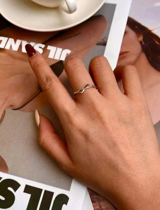 Anillo plateado y ajustable