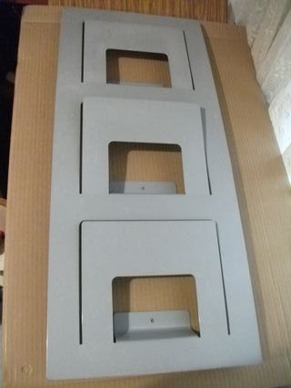 Revistero organizador metálico gris