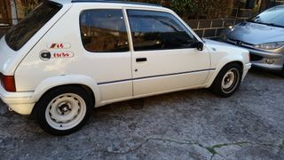 Tapa centro de llanta peugeot 205 