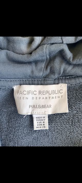 Sudadera gris con mensaje