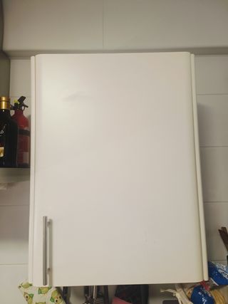Cocina con lavadora y microondas