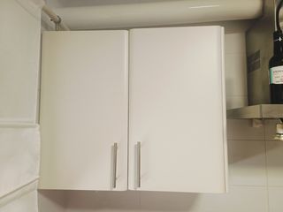 Cocina con lavadora y microondas