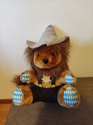 Peluche leone con cappello e salopette Oktoberfest