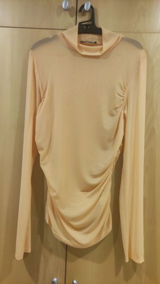 Top transparente salmón cuello alto