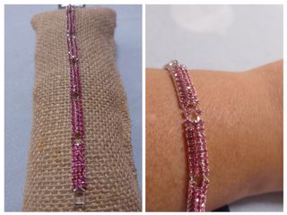 Pulsera de plata con piedras rojas