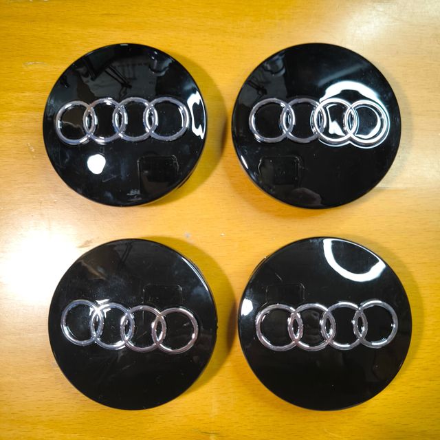 TAPABUJES AUDI 68mm NEGRO - EMBLEMA LLANTAS AUDI