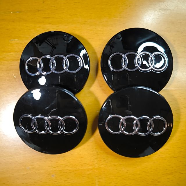 TAPABUJES AUDI 68mm NEGRO - EMBLEMA LLANTAS AUDI