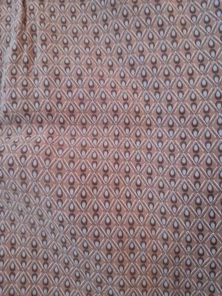 Falda corta beige con estampado