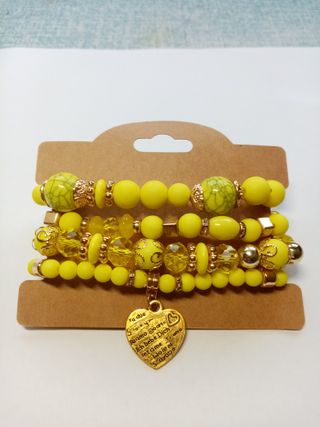 Pulseras de cuentas doradas y amarillas