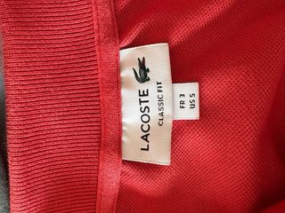Polo Lacoste hombre coral