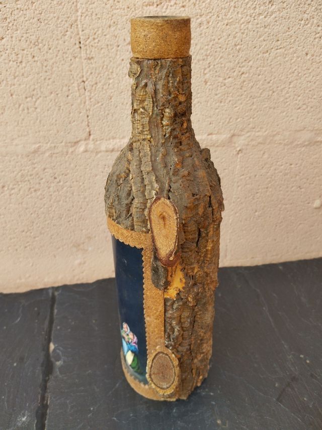 Bottiglia decorata con immagine religiosa