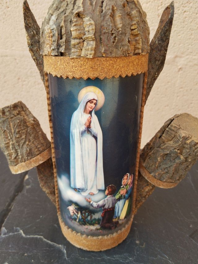 Bottiglia decorata con immagine religiosa