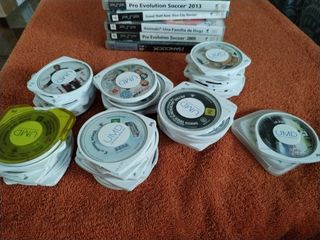 Lote 63  Juegos PSP UMD

Y 5 cajas vacías 