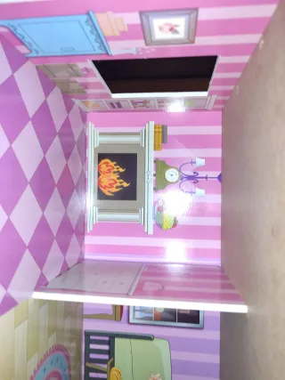 Casa de muñecas rosa