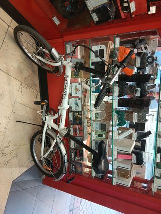 Bicicleta blanca 20 bien cuidada