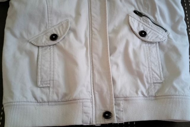 Abrigo tipo cazadora blanco chica