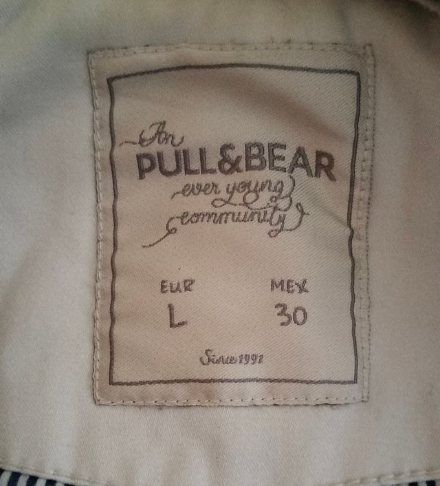 Abrigo tipo cazadora blanco chica