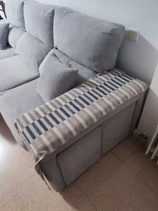 Sofá gris de tela