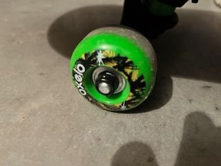 Skate Oxelo con diseño de dinosaurio