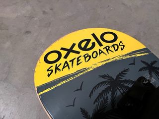 Skate Oxelo con diseño de dinosaurio