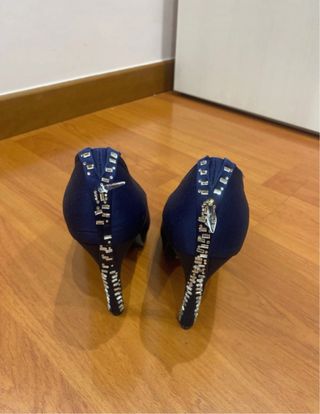 Décolleté donna blu con brillantini