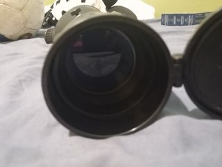 Lente de binóculo com bolsa